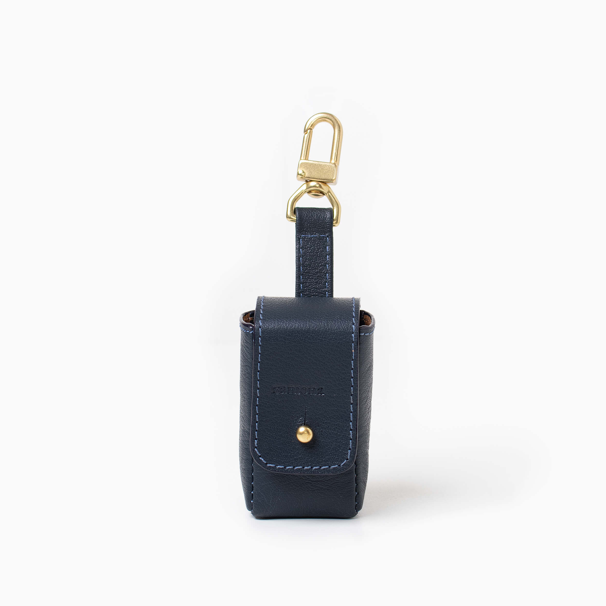 Navy blue leather bag holder with with brass hardware. Poop bag holder.
