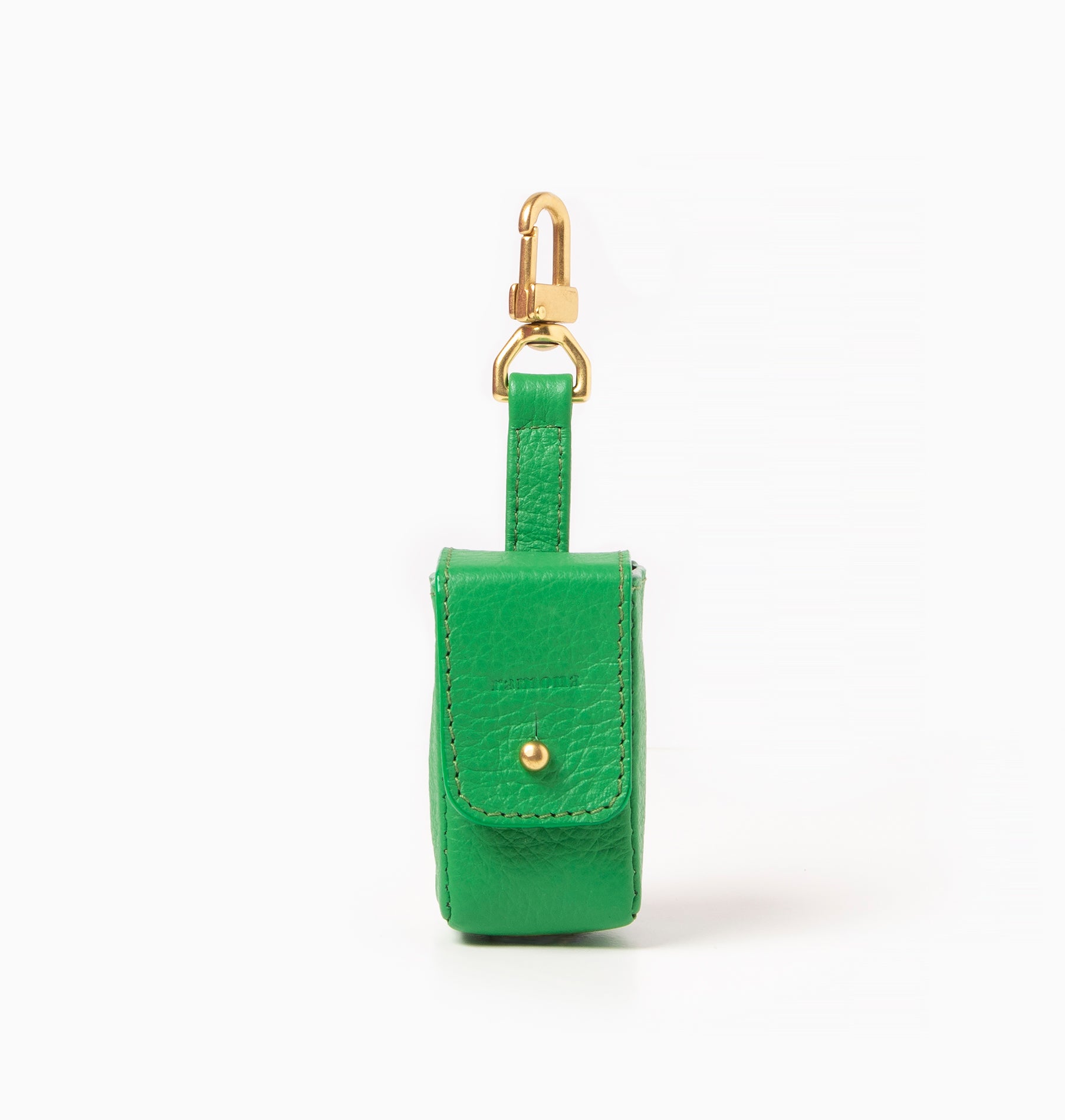 Emerald green leather bag holder with with brass hardware. Poop bag holder.
